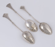 Three assorted Russian silver spoons with engraved backs, early 20th century, the largest 14cm long, 50 grams total