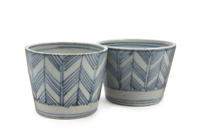 A pair of Japanese porcelain cups, Edo period, late 18th, early 19th century, ​5.5cm high, 6.5cm diameter