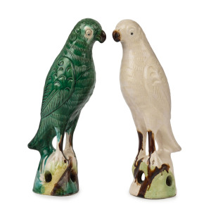 Two Chinese export pottery parrot statues, 19th/20th century, ​30cm and 31cm high