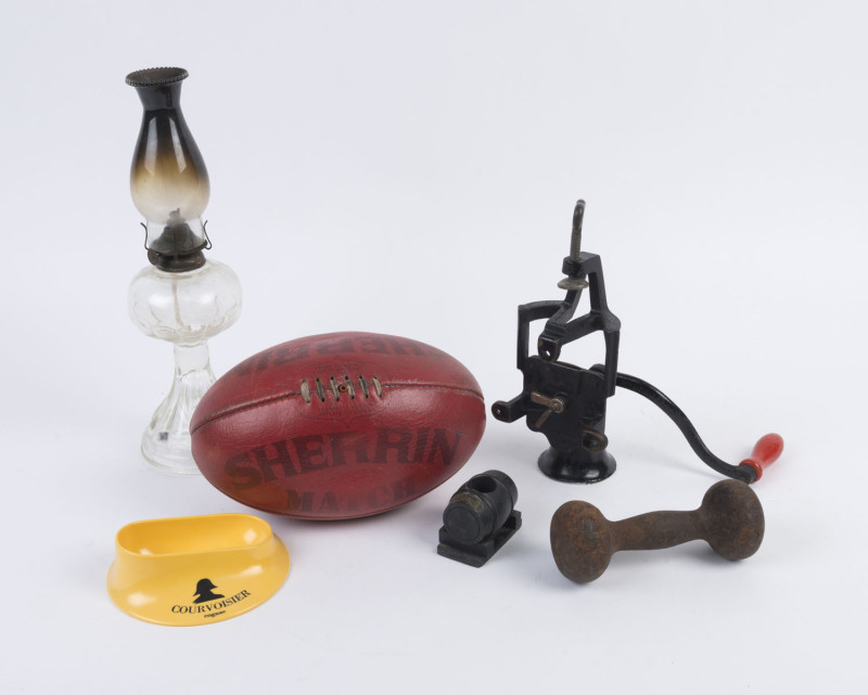 Vintage Sherrin football, Beatrice coffee grinder, vintage oil lamp, old dumbbell weight, Guinness advertising ware match vesta and a Courvoisier Cognac yellow plastic bowl, (6 items), ​the lamp 38cm high