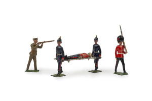 BRITAINS: - 54mm Hollow Cast Lead - Diverse Selection: in early 20th century uniforms or battledress with stretcher bearers, stretchers and injured soldiers, Canadian Mounties, Dragoons, British soldiers in khaki uniforms firing rifles (9), and various mi