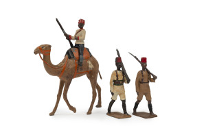 BRITAINS: - 54mm Hollow Cast Lead - Kings African Rifles soldiers (18, all with articulated left arm holding rifle), plus four Egyptian Camel Corps figures with Camels. (22 items)