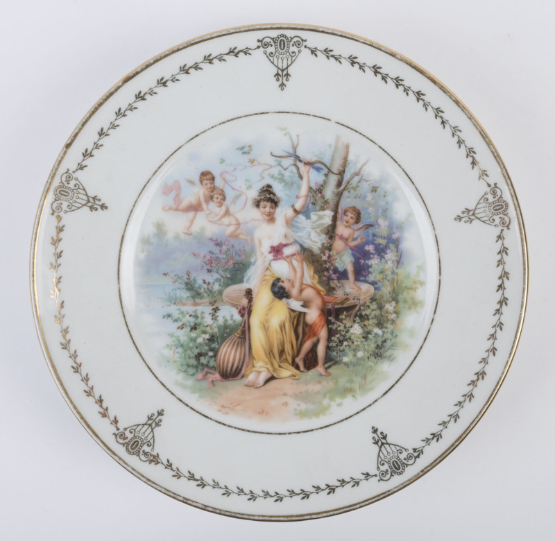 An antique musical porcelain tazza, hand-painted top with Swiss musical movement, 19th century, 6cm high, 24.5cm diameter