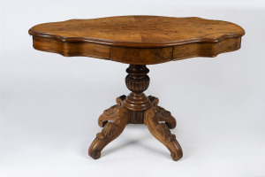 An antique centre table, burr walnut with shaped top and pedestal base, circa 1875, 71cm high, 115cm wide, 68cm deep