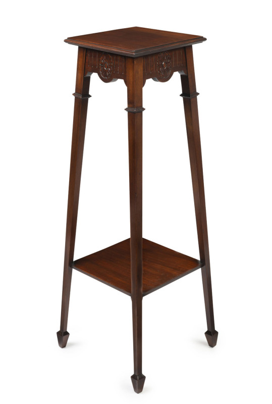 An antique two tiered walnut pedestal, square form tapering legs with spade feet, circa 1900, ​106cm high, 30cm wide, 30cm deep