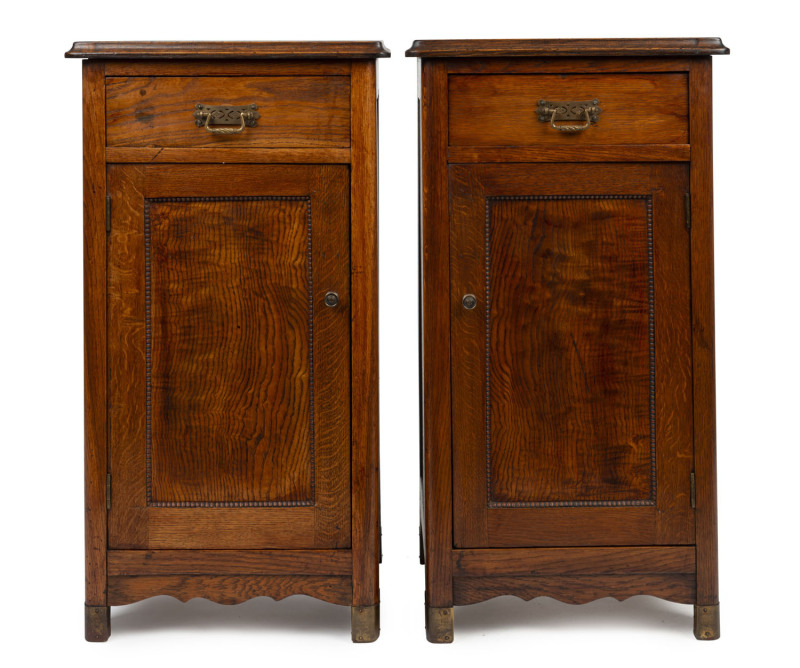 A pair of French provincial style oak and elm bedside cabinets, late 19th century, 79cm high, 43cm wide, 37cm deep