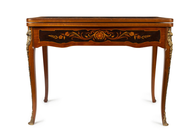 A French marquetry games table with ormolu mounts, 20th century, 82cm wide, 106cm wide, 56cm deep