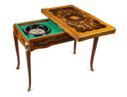 A French marquetry games table with ormolu mounts, 20th century, 82cm wide, 106cm wide, 56cm deep - 2