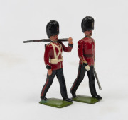 BRITAINS: - 54mm Hollow Cast Lead - Finely Painted Fusiliers: all in marching stance, including a single officer. (13)