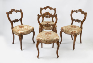 A set of four antique English carved walnut dining chairs with French cabriole legs, circa 1875 