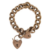 An antique 9ct rose gold curb link bracelet with two heart locks, each link stamped "9c", ​26.5 grams