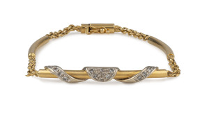 An 18ct gold bracelet set with white gold and diamonds, ​20cm long, 16.5 grams