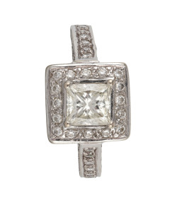 A stunning 18ct white gold ring set with a 1ct plus white diamond surrounded by diamonds in a square setting, stamped "750, 18ct", 7.5 grams total