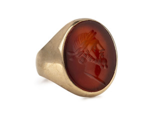 An antique yellow gold signet ring set with intaglio cut carnelian seal, 19th century, ​9.7 grams total