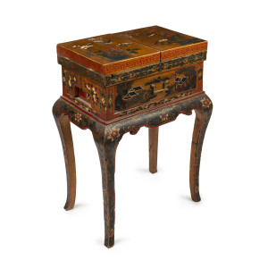 A Chinese export dressing table, fold-over top with hand-painted finish on gold background, Qing Dynasty, mid 19th century, ​83cm high, 62cm wide, 41cm deep