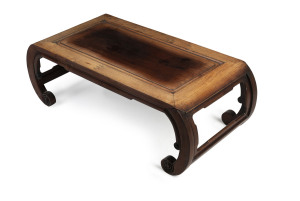 A Chinese opium table, carved rosewood, early 20th century, 33cm high, 99cm wide, 45cm deep