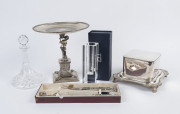 A silver plated centrepiece, biscuit barrel and carving set together with a ship's decanter and a crystal vase (5 items), the centrepiece 30cm high