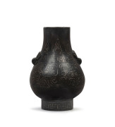 A Chinese bronze vase with ornate silver inlay, Ming Dynasty, 16th century, ​7cm high