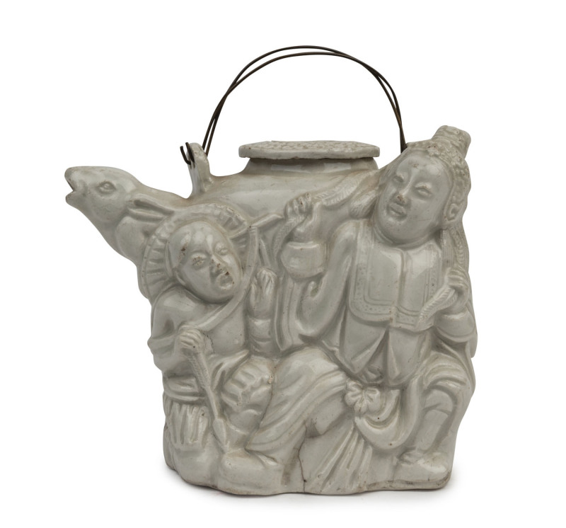 A Chinese blanc de chine figural teapot, Ming Dynasty, ​11.5cm high, 13.5cm wide