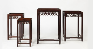 A nest of four Chinese rosewood tables, early 20th century, the largest 66cm high, 45cm wide, 34cm deep