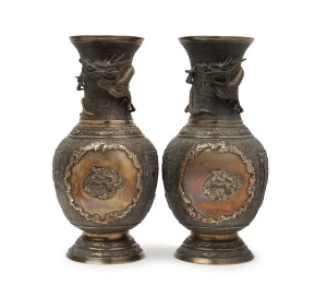 A pair of Chinese bronze dragon vases, Qing Dynasty, 19th century, seal mark to sides, ​36cm high