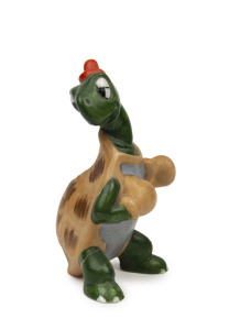 TOBY TORTOISE RETURNS: painted and glazed ceramic toothbrush holder figurine (repaired foot) of "Toby Tortoise" wearing boxing gloves, Disney authorized product by Maw of London with registration number on base; height 10.5cm; c. late 1930s.