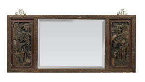 A Chinese wall mirror in ornate carved and lacquered frame, 19th/20th century, ​ ​52 x 115cm