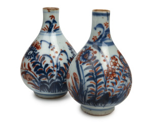 A pair of Japanese Imari miniature sake bottles, circa 1680, 8cm high PROVENANCE B. F. Edwards Collection