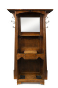 An English Arts and Crafts oak hallstand, circa 1905, ​184cm high, 102cm wide, 38cm deep