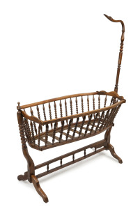 An antique English spindle cradle, fruitwood and beech, 19th century, ​166cm high, 125cm wide, 54cm deep