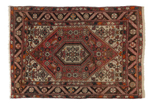 A vintage hand-knotted Turkoman rug, circa 1920s, 160 x 107cm