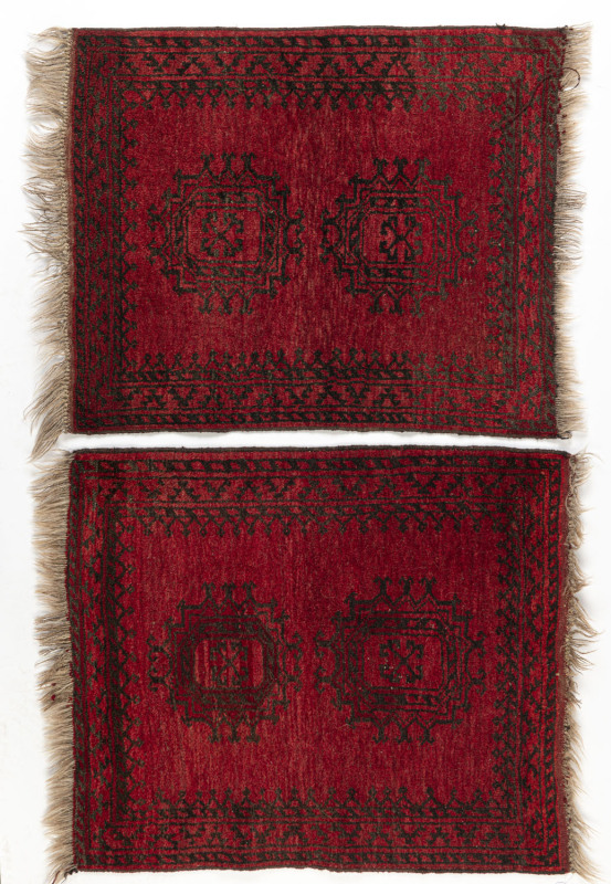 Two hand-woven red patterned tribal mats, 20th century, ​95 x 72cm each