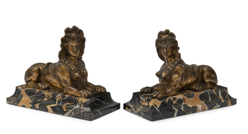 A pair of French gilded bronze Sphinx statues on marble bases, 19th century, ​15cm high, 18.5cm long