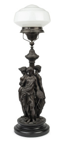 An impressive cast spelter figural lamp with milk glass shade, late 19th century, ​87cm high