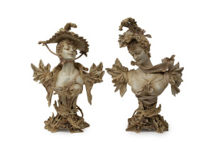 A pair of Austrian Art Nouveau porcelain busts by Stellmacher, late 19th century,41cm and 42cm high