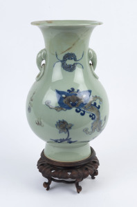 A Chinese celadon porcelain dragon vase (badly damaged), on wooden stand, Republic period, ​47cm high overall