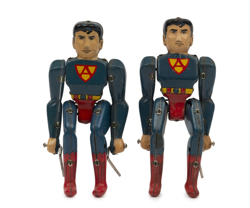 LINEMAR: Action Hero lithographed tin plate toys (2) both with large 'A' in Shield on chest, articulated arms and legs, both figures holding metal pins that would have attached to an army tank; c.1958, each 12cm high. Linemar produced a similar figure in