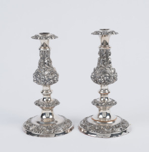 A pair of antique Sheffield plate candle sticks, 19th century, 22cm high