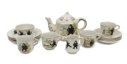 "FELIX THE CAT": children's ceramic tea set comprising teapot with lid, sugar bowl, creamer, 4 teacups with saucers & 4 tea plates, the teapot stamped "Shell/Made in England" on base; c.1920s.