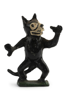 "FELIX THE CAT": rare hollow lead figurine with Felix in a "Thumbing Nose" posture, made by Pixyland (London, England); c.1920s, height 5.5cm.