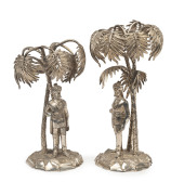 A pair of English silver plated table centrepieces with figural columns depicting Indian soldiers, by Walker & Hall, 19th century. Originally from the Officer's mess, British Army Barracks, Hyderabad, India. 25cm and 27cm high