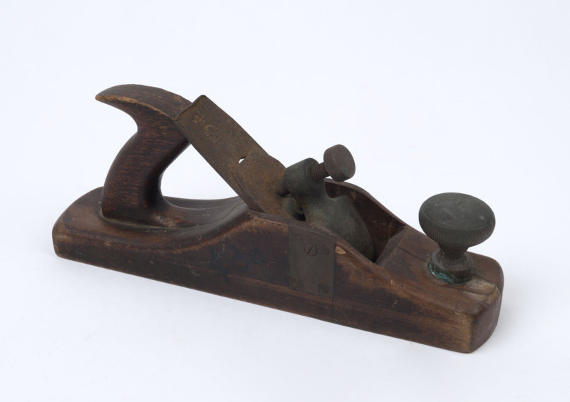 An antique hand plane, hardwood and steel with brass blade keeper, 19th century, ​300cm sole