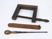 Antique silky oak bevel gauge, antique German rectangular clamp and an antique turn screw (screwdriver), 19th century, the clamp 45cm high