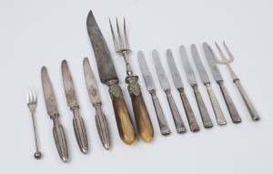 Antique carving knife and fork, sterling silver bread fork, six sterling silver fruit knives, three Christofle silver plated knives and a silver plated condiment fork, 19th and 20th century, the carving knife 31cm long