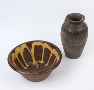 An English slipware pottery mixing bowl and a tall pottery amphora style vase, the vase 30cm high