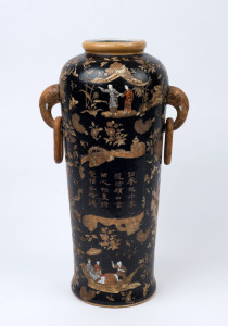 A tall Chinese porcelain vase with black background and elephant head handles, 20th century, 47cm high