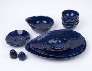 Hertha Bengtson for Rörstrand, "Blå eld" (Blue Fire) Swedish porcelain table ware, 1960s, comprising serving platters, bowls, saucers and condiments, (15 items), the largest 40cm wide