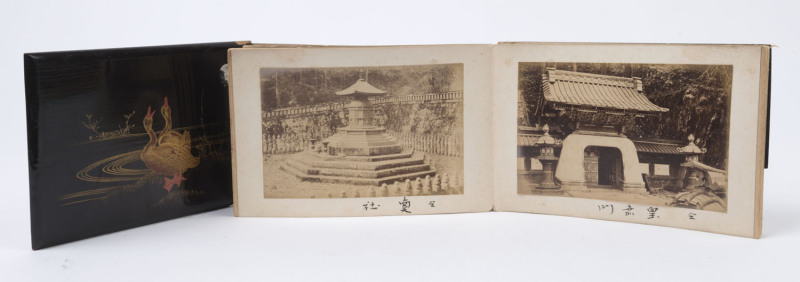 JAPAN: A small photograph album, circa 1900, with laminated wooden covers (defective) containing a collection of 50 albumen prints affixed to the folding pages; each print approx. 9 x 14cm and mostly depicting traditional subjects; a few villages scenes,