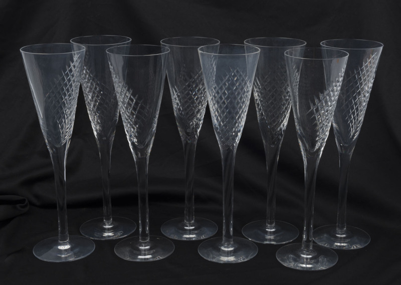 KOSTA set of eight Swedish cut crystal champagne flutes, 20th century, engraved "Kosta", ​23.5cm high