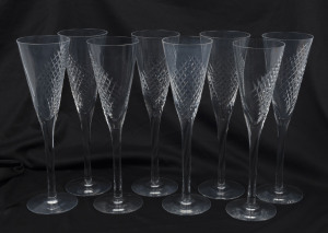 KOSTA set of eight Swedish cut crystal champagne flutes, 20th century, engraved "Kosta", 23.5cm high